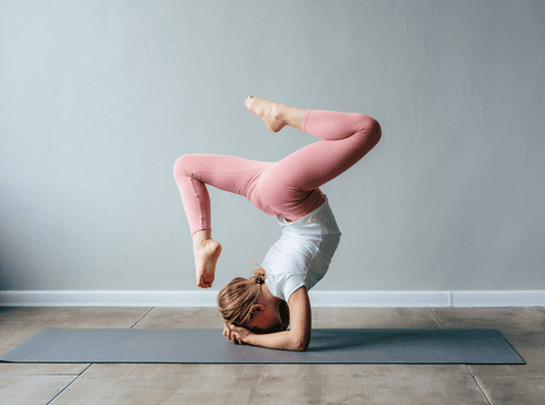 Dancer practicing an acro balance pose
